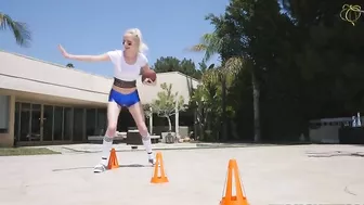 Cute blonde football player displays her XXX booty under the sun