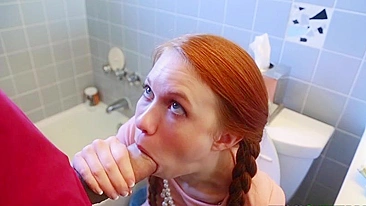 Twin-tailed redhead sucks fat XXX cock while being stuck on the can