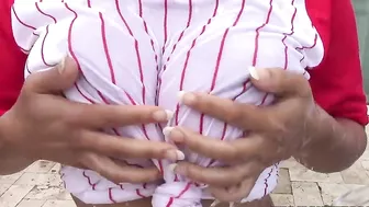 Busty Latina baseball player has her XXX jugs watered down in backyard