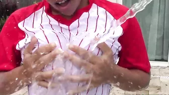 Busty Latina baseball player has her XXX jugs watered down in backyard