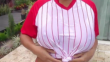 Busty Latina baseball player has her XXX jugs watered down in backyard