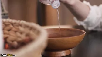 Platinum blonde girl touches guy's back with titties before sex in bed