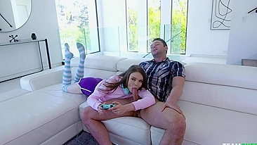 Gamer girl has her mouth fucked by the XXX stallion on a white sofa