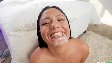 Latina XXX whore with naked boobs receives boy's sperm on her face