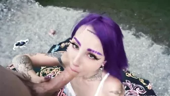 Purple-haired minx polishes friend's XXX cock outdoors by the lake