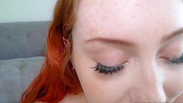 Sultry redhead with big XXX melons sucks thick weenie in POV video