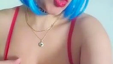 Naughty Arab gal in blue wig displays her XXX melons on the camera