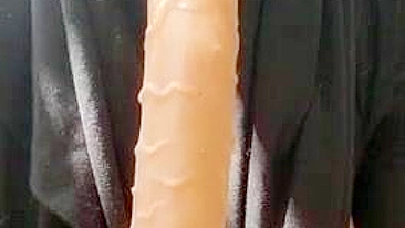Sexy Arab mom in hijab plays with XXX dildo in front of the camera