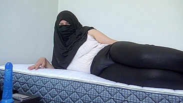 Pretty Arab hottie in hijab satisfies herself using new XXX dildo