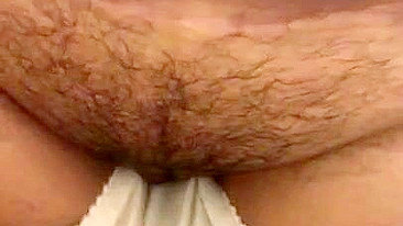 Horny Arab mom pulls down pants revealing her amazing hairy XXX twat