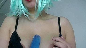 Busty Aribic mom in eccentric wig plays with XXX dildo in front of cam