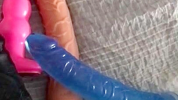 Eccentric Arab mom demonstrates on cam her collection of XXX toys