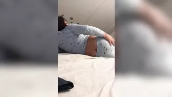 Lebanese woman takes pants down to expose XXX shaped butt in bed