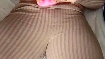 Iraqi mom is happy with pink XXX toy caressing pussy through pants