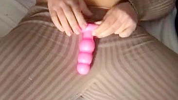 Iraqi mom is happy with pink XXX toy caressing pussy through pants