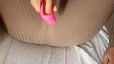 Iraqi mom is happy with pink XXX toy caressing pussy through pants