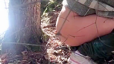 Filthy Arabic XXX gal in hijab takes pants off to pee in the forest