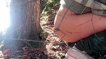 Filthy Arabic XXX gal in hijab takes pants off to pee in the forest