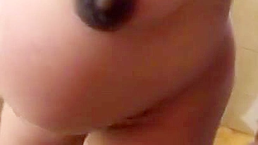 Pregnant Iranian XXX mom in hijab poses naked and pees in the toilet