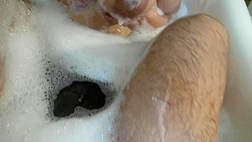 Big-tittied XXX Arab mom pleases man with soapy handjob in the bathtub