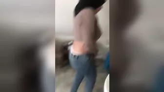 Teeny in hijab peels tight jeans off and pees in amateur XXX clip