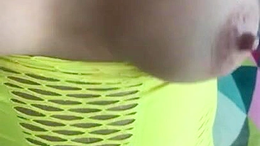 Arab takes tits out of green dress and shows off other XXX parts