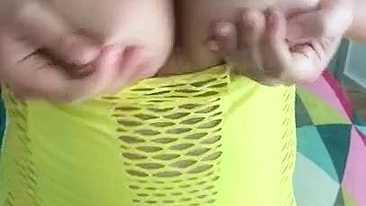 Arab takes tits out of green dress and shows off other XXX parts