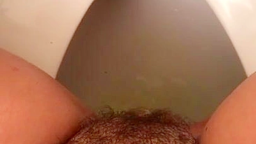 Egyptian mom is happy allowing herself to enjoy pissing in solo XXX video