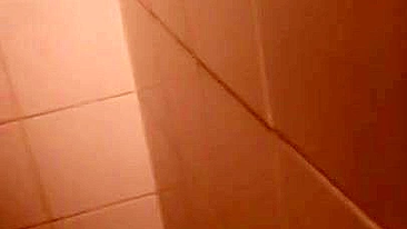 Lecherous Arab mom is captured naked in shower by the XXX cameraman
