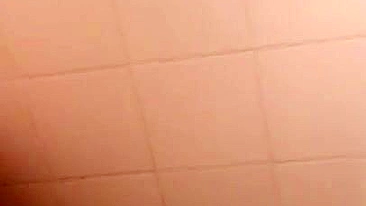 Lecherous Arab mom is captured naked in shower by the XXX cameraman