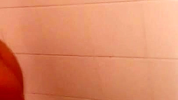 Lecherous Arab mom is captured naked in shower by the XXX cameraman