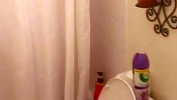 Lecherous Arab mom is captured naked in shower by the XXX cameraman