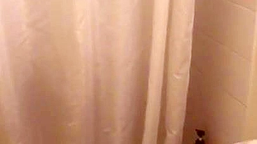 Lecherous Arab mom is captured naked in shower by the XXX cameraman