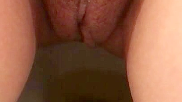 Arab mom captures unshaved muff as she pisses in the solo XXX video