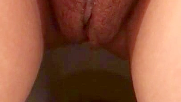 Arab mom captures unshaved muff as she pisses in the solo XXX video