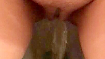 Arab mom captures unshaved muff as she pisses in the solo XXX video