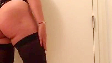 Arab mom in stockings wears thick pink XXX strapon and moves her body