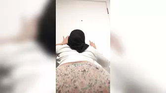 Stacked mom in hijab and tight pants moves her XXX shaped ass on camera