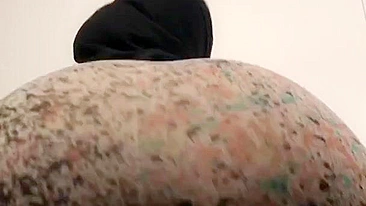 Stacked mom in hijab and tight pants moves her XXX shaped ass on camera