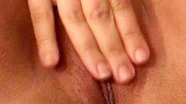 Gorgeous mom with hijab touches pussy and spreads labia in XXX video