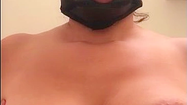 Arab mom with XXX mask on face sticks tongue out asking for some sperm