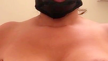 Arab mom with XXX mask on face sticks tongue out asking for some sperm