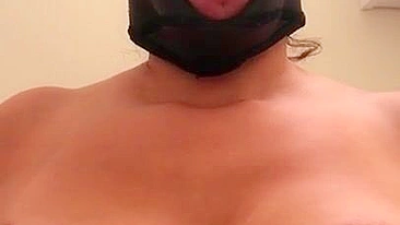 Arab mom with XXX mask on face sticks tongue out asking for some sperm