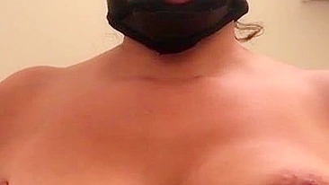 Arab mom with XXX mask on face sticks tongue out asking for some sperm