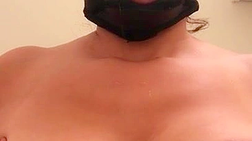 Arab mom with XXX mask on face sticks tongue out asking for some sperm