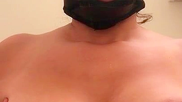 Arab mom with XXX mask on face sticks tongue out asking for some sperm