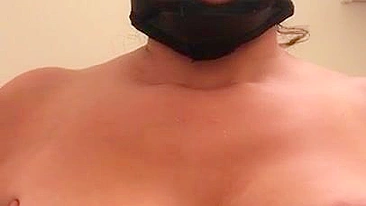 Arab mom with XXX mask on face sticks tongue out asking for some sperm