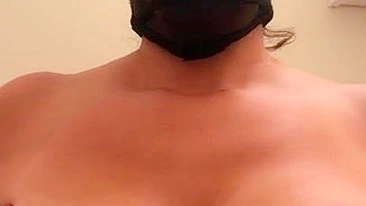 Arab mom with XXX mask on face sticks tongue out asking for some sperm