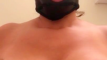 Arab mom with XXX mask on face sticks tongue out asking for some sperm