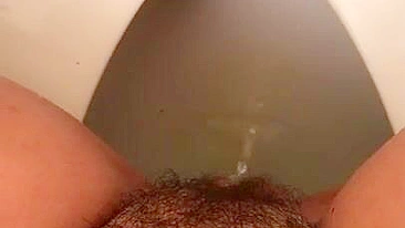 Lebanese mom loves hairy pussy and captures it during XXX pissing